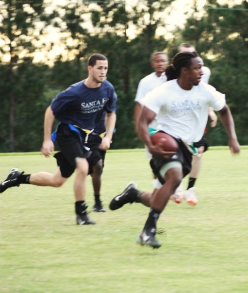 As a sprinter, I chose distance running as my New Year's resolution. Picture of me sprinting.