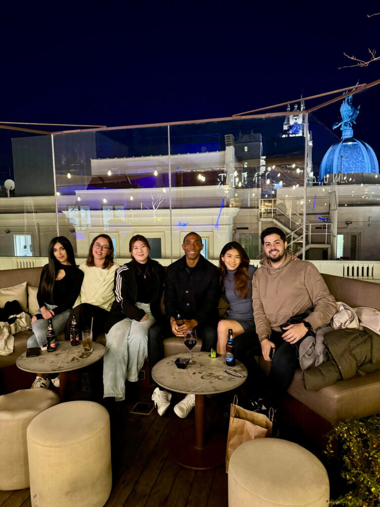 Friends from different countries sharing a night out — a snapshot of the social side of the nomad lifestyle.